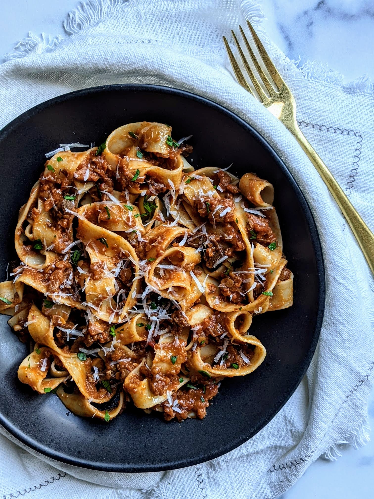 red lentil Bolognese with mushrooms, pasta and cheese